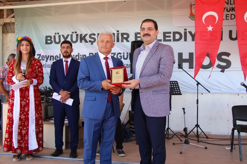 HİZMET BİZİM BOYNUMUZUN BORCU